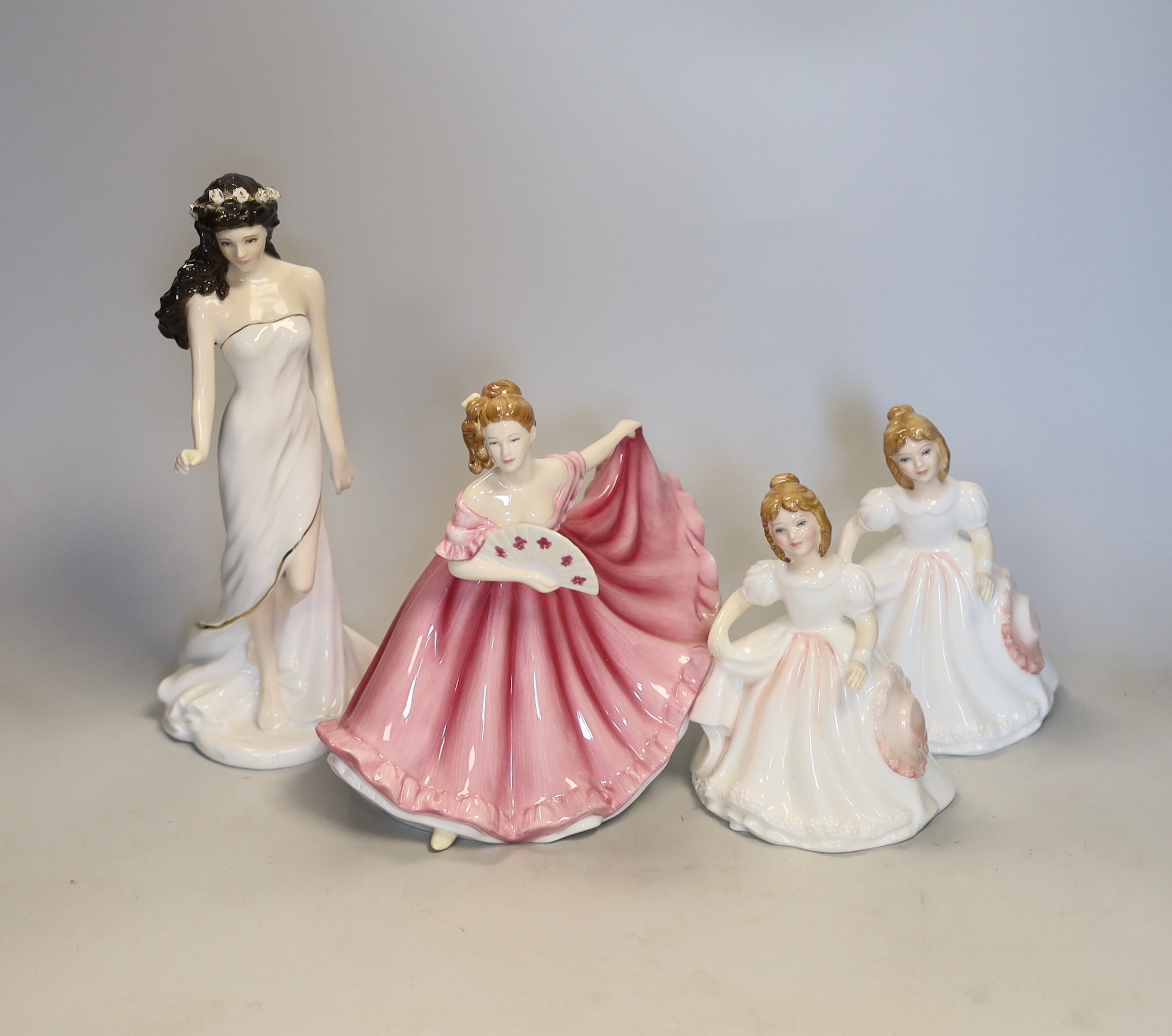 Thirteen Royal Doulton figures and two Royal Worcester figures, all boxed, together with four other unboxed figurines